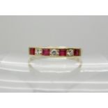 An 18ct gold ruby and diamond half eternity ring, size V1/2, weight 2.6gms Condition Report: