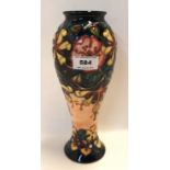 A Moorcroft Honeysuckle decorated vase of tapering form Condition Report: Available upon request