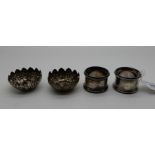 A lot comprising a pair of silver salts, Glasgow 1895 and a pair of silver napkin rings,