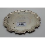 A silver card tray, Sheffield 1992, circular with scalloped rim, monogrammed TD and dated 11-4-'