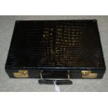 A black briefcase with Sesamee combination lock and two leather cases (3) Condition Report: