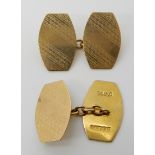 A pair of 9ct gold engine turned cufflinks, weight 5.1gms Condition Report: Available upon request