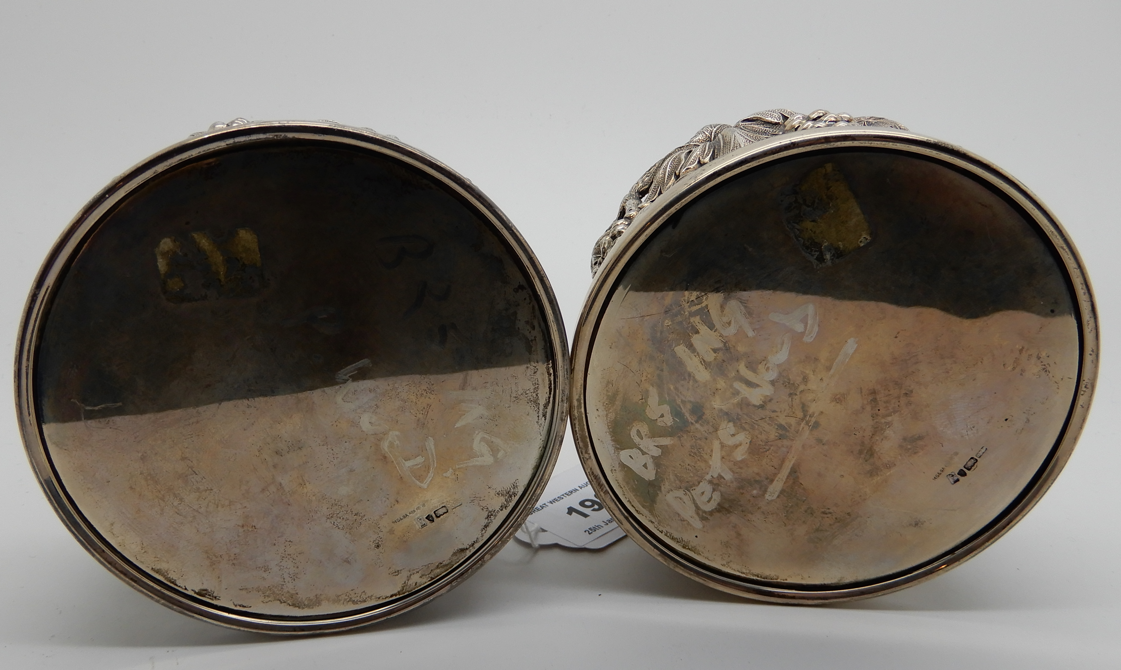 A pair of continental silver wine coasters, marked 925, circular with fruit and vine embossed - Image 3 of 3