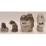 Four Royal Copenhagen figures including a snowy owl, a pair of owls, a mouse and an otter