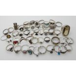 A collection of silver and white metal rings, many gem set Condition Report: Not available for