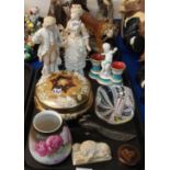 A Copeland cherub inkwell, a pair of pottery figures, an Italian circular glass box, latticino glass