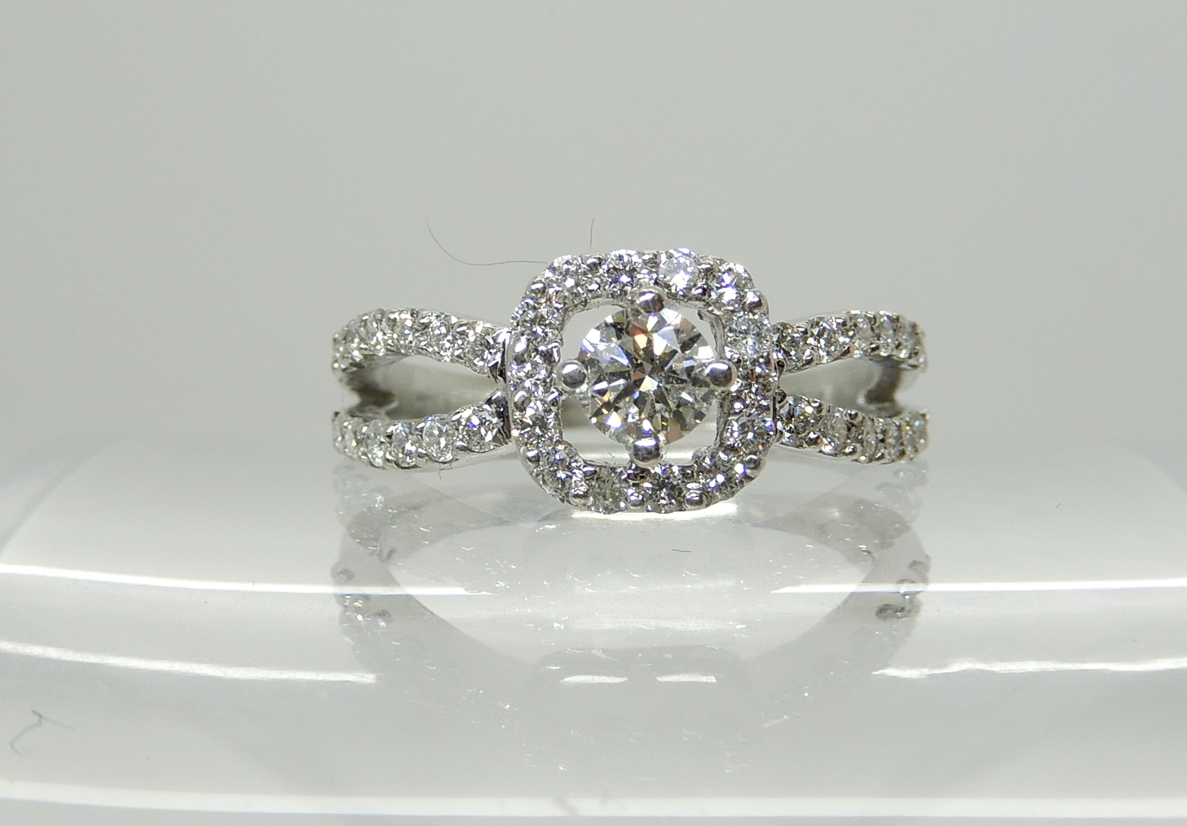 A platinum diamond cluster ring set with estimated approx 0.60cts of brilliant cut diamonds, the - Image 2 of 4
