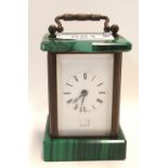 A miniature Dunhill carriage clock with malachite to top and base, 8cm high (chipped) Condition