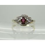 An 18ct pink gem and diamond accent ring, size M, weight 2.7gms Condition Report: Available upon