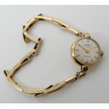 A 9ct Gradus ladies vintage watch and expanding strap, weight including mechanism 11.5gms