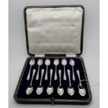 A cased set of twelve coffee spoons, Sheffield 1921 Condition Report: Available upon request