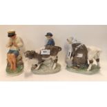 A pair of Royal Copenhagen figures of a boy and girl with cows, models 772 and 779 and another of