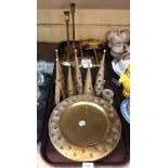 Brass decorative platters, and candle holders, a pair of wall lights and a pair of candlesticks