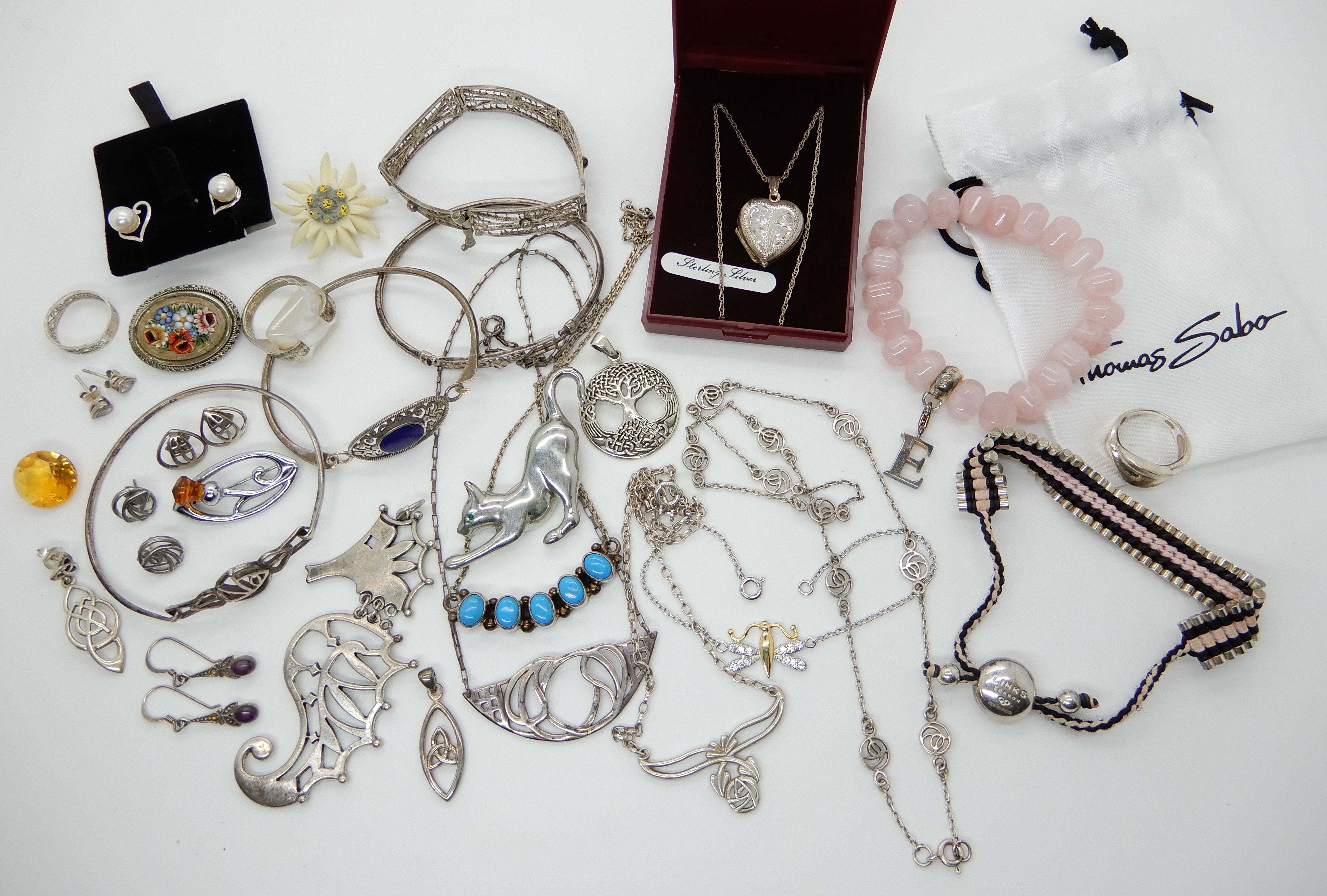 A collection of silver and costume jewellery to include items stamped Links of London, Thomas