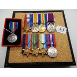 A lot comprising a mounted WWI group of four including a 1914 star and a long service and good