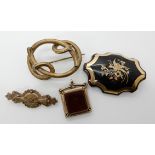 A pique wear brooch with a bird design and three vintage gold plated items Condition Report: Not