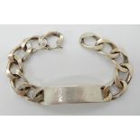 A gents silver curb link bracelet Condition Report: Not available for this lot