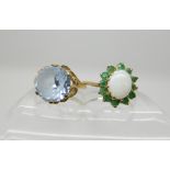 A 9ct gold opal and emerald cluster ring size N/12 and a 9ct blue gem set ring with scroll setting