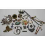 A silver charm bracelet, a silver 'Baby' brooch and other items of silver and costume jewellery