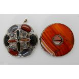 A white metal Scottish agate pebble brooch and a white metal banded carnelian brooch Condition