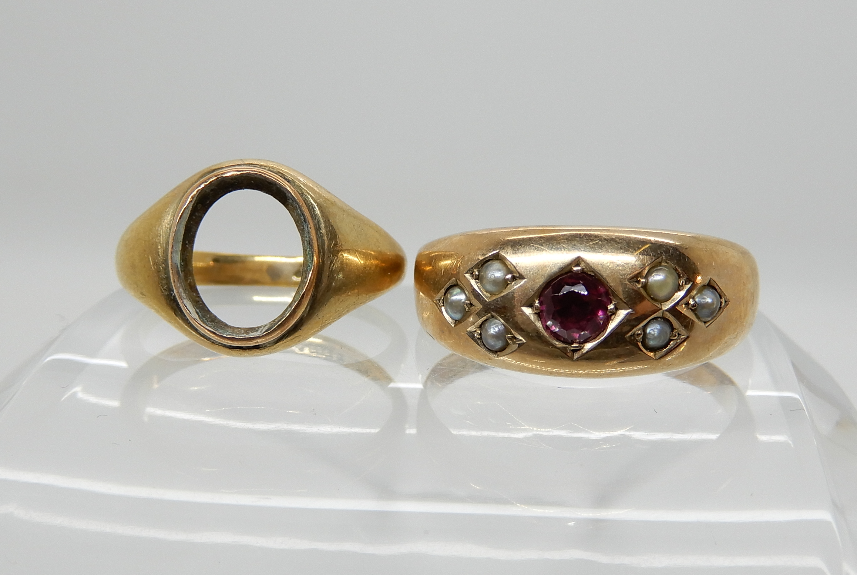 A 9ct pink gem and pearl ring size R1/2 and a 9ct gold signet ring without stone size G1/2, weight