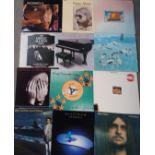 A box of vinyl L.P. records to include Vangelis, Mike Oldfield, Jon Anderson, Deodato, The Allmann