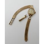 A 9ct Majex ladies watch (clasp af), weight including mechanism 11.9gms Condition Report: