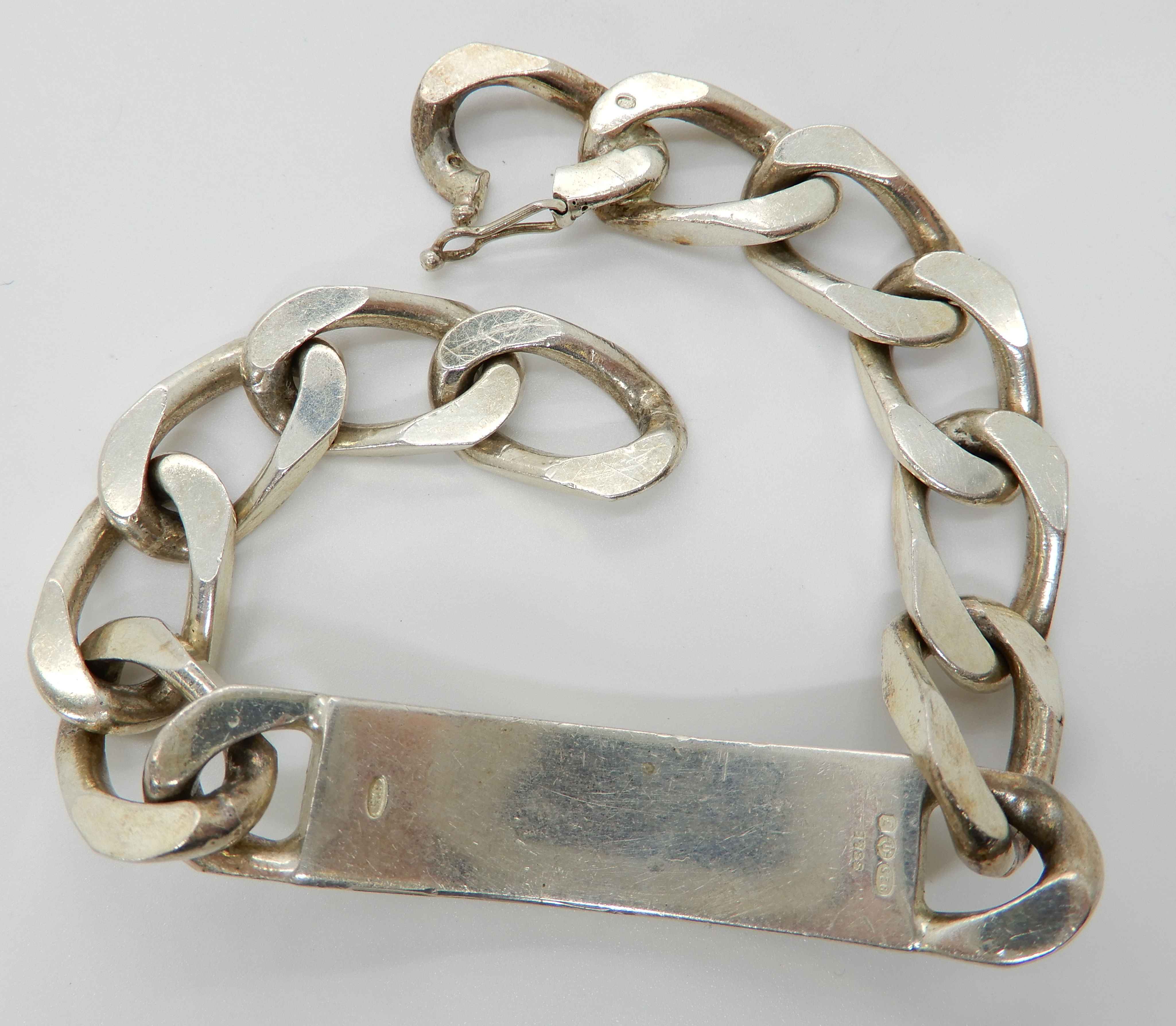 A gents silver curb link bracelet Condition Report: Not available for this lot - Image 2 of 2