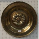 A brass alms dish with stamped decoration and raised wording Condition Report: Available upon