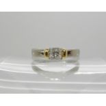 An 18ct white and yellow gold princess cut diamond ring set with estimated approx 0.40cts, with