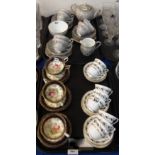 Five Paragon flower decorated cups and saucers, Bernina coffee set, and lady artist decorated teaset