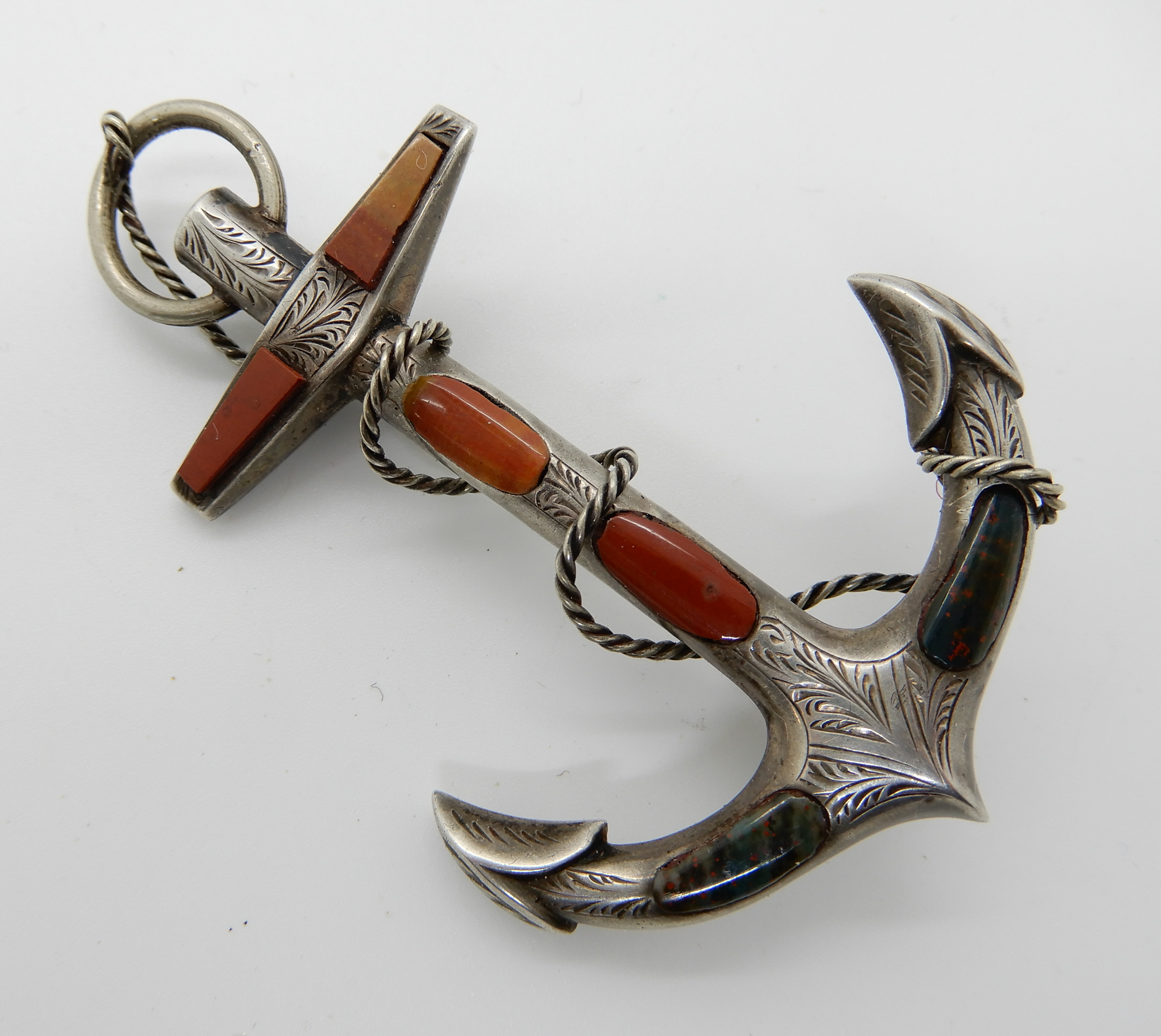 A white metal Scottish agate brooch in the shape of an anchor Condition Report: Not available for