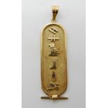 A bright yellow metal Egyptian hieroglyph pendant with Arabic gold stamps, weight approx 4.7gms