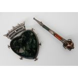 A silver luckenbooth by Hamish Dawson Bowman set with moss agate and a silver sword brooch inlaid