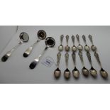 A lot comprising a set of twelve silver teaspoons (loose), Sheffield 1897 and three silver sauce