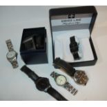 A collection of gents fashion watches Condition Report: Available upon request