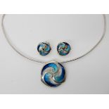 A silver and enamel Sheila Fleet pendant necklace and matching earrings Condition Report: Not