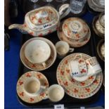 A Derby tea and coffee wares comprising a teapot, five coffee cans and saucers, oversized cup and