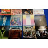 A collection of Vinyl L.P. rock and progressive rock records to include Camel, Spyro Gyra, 10cc,