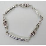 A silver gem set Hamilton & Inches bracelet Condition Report: Not available for this lot