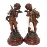 A pair of spelter figures of cherubs Condition Report: Available upon request