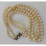 A double string of pearls with a 9ct diamond and pearl set clasp, largest pearl approx 8.7mm,