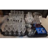 Assorted glassware including art glass bowl, hourglass decanter and assorted cut glass drinking