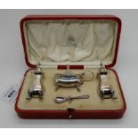 A cased three piece silver condiment set (matched), Chester and Birmingham marks, 103gms Condition