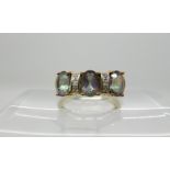 A 9ct gold mystic topaz and diamond accent ring, size N1/2, weight 4.1gms Condition Report: