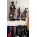 A collection of resin figures of tribal warriors and others Condition Report: Available upon
