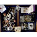 An Oriental wooden box full of costume jewellery Condition Report: Not available for this lot