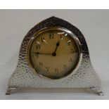 A white metal cased mantle clock Condition Report: Available upon request