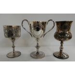 A lot comprising three silver plated trophy goblets, various inscriptions (3) Condition Report: