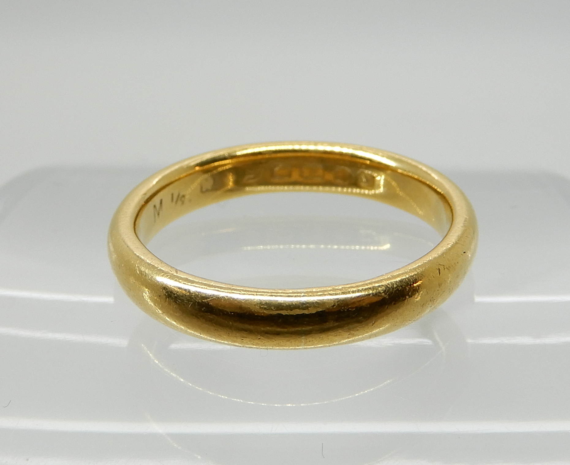 A 22ct gold wedding ring size P1/2, weight 5.9gms Condition Report: Available upon request